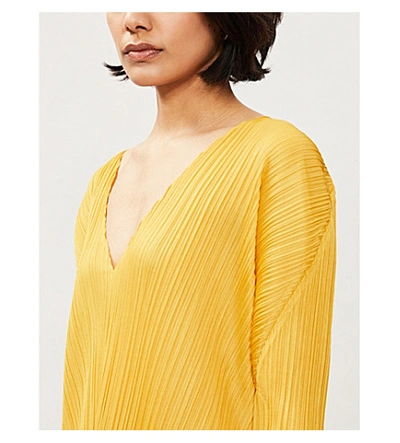 Shop Issey Miyake Pleated Long-sleeved Plissé Midi Dress In Golden+yellow