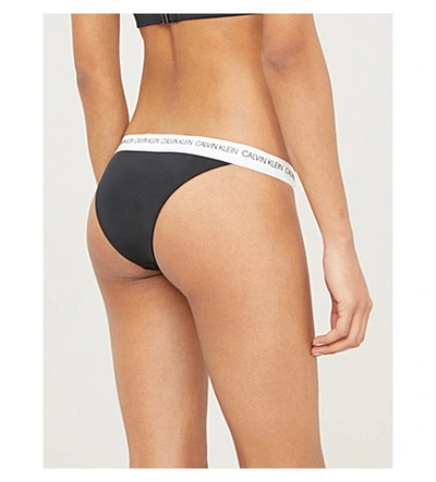 Shop Calvin Klein Ck Logo-print Bikini Bottoms In Beh Pvh Black
