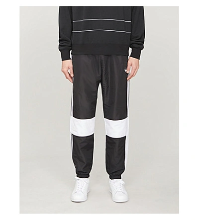 Shop Adidas Originals Logo-print Shell Jogging Bottoms In Black