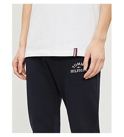 Shop Tommy Hilfiger Brand-embroidered Tapered Cotton Jogging Bottoms In Medium Grey Heather