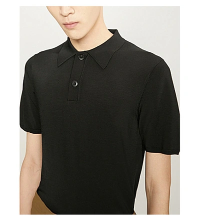 Shop Sandro Fine Stretch-knit Polo Shirt In Black