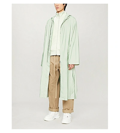 Shop Fear Of God Longline Hooded Shell Coat In Army+iridescent