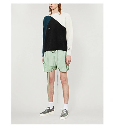 Shop Fear Of God Logo-badge Shell Shorts In Army Iridescent