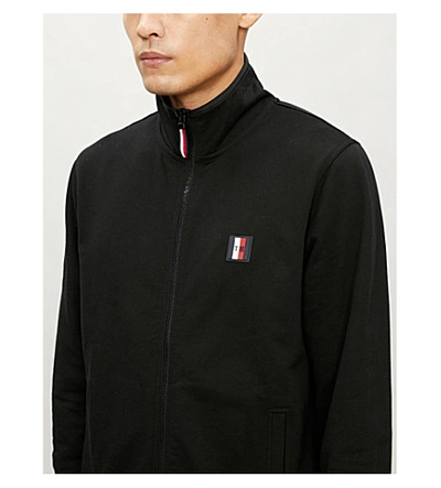 Shop Tommy Hilfiger Logo-patch Zip-up Cotton-jersey Sweatshirt In Black