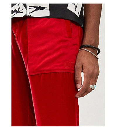 Shop Amiri Drawstring-cuff Straight Velvet Jogging Bottoms In Red