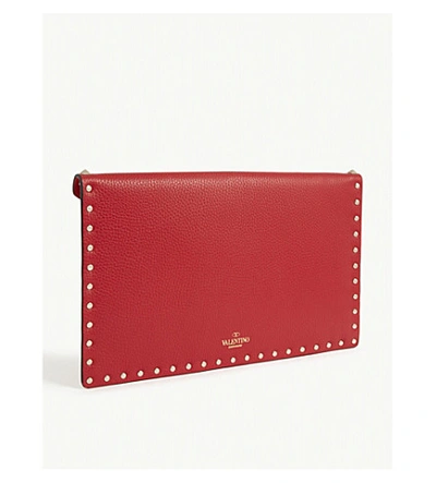 Shop Valentino Rockstud Envelope Leather Clutch In Rouge Pur