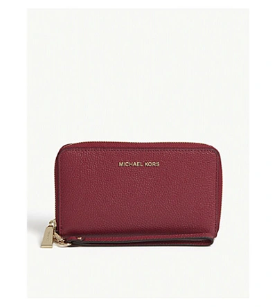 Shop Michael Michael Kors Leather Travel Phone Case In Berry