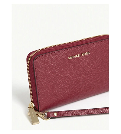 Shop Michael Michael Kors Leather Travel Phone Case In Berry