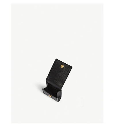 Shop Saint Laurent Monogram Leather Airpods Case In Black Gold
