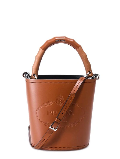 Shop Prada Logo Bucket Bag In Brown