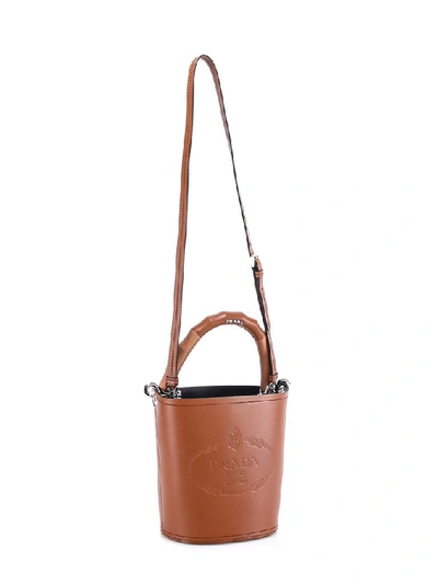 Shop Prada Logo Bucket Bag In Brown