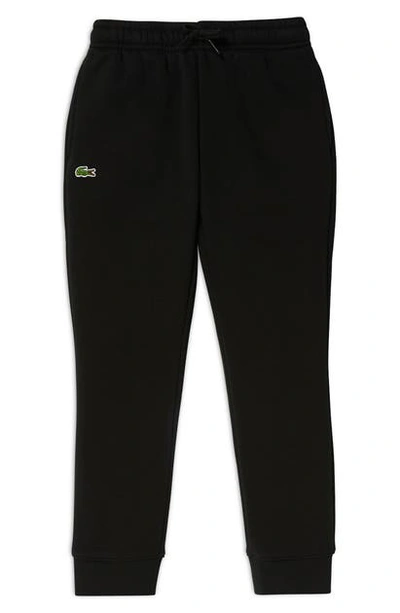 Shop Lacoste Solid Fleece Jogger Sweatpants In Black