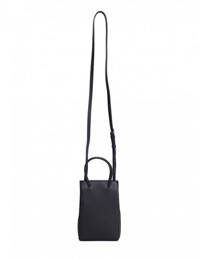 Shop Balenciaga Black Shopping Phone Holder Bag