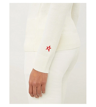 Perfect Moment Intarsia Merino Wool Turtleneck Sweater In White Peach Pink Rainbow
