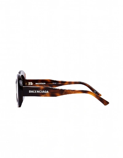 Shop Balenciaga Logo Printed Oval Sunglasses In Brown