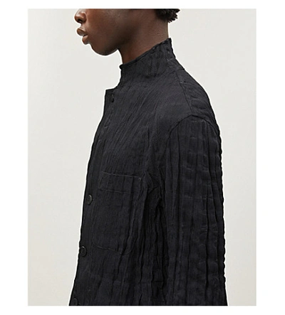 Shop Issey Miyake Torus Funnel-neck Crinkled Knitted Jacket In Black