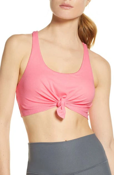 Shop Alo Yoga Knot Sports Bra In Macaron Pink
