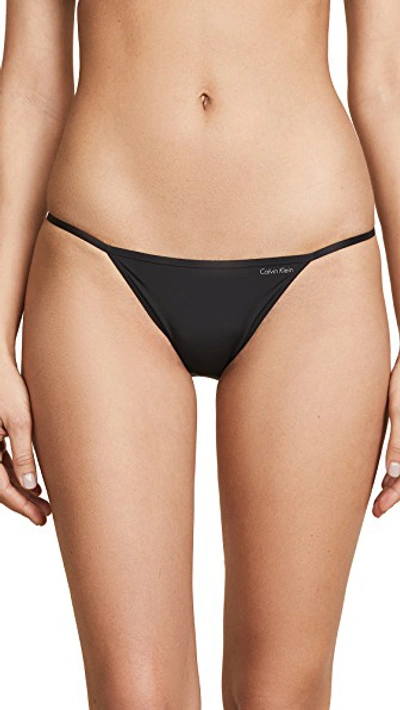 Shop Calvin Klein Underwear Sleek String Bikini Panties In Black