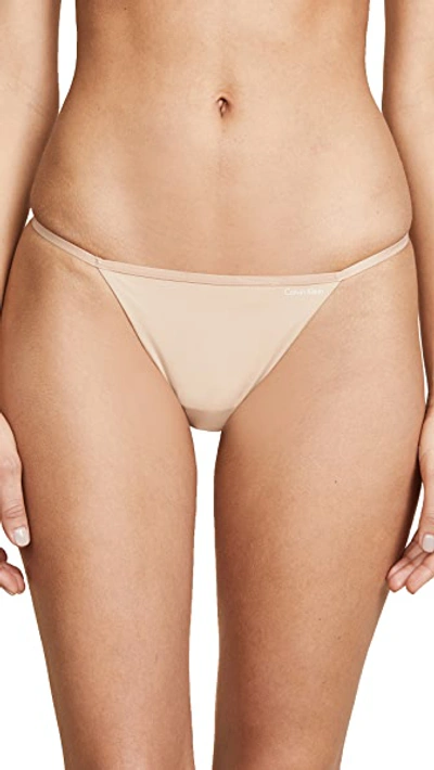 Shop Calvin Klein Underwear Sleek Model Thong Bare L