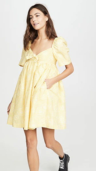 Shop Pushbutton Puff Mini Dress In Yellow