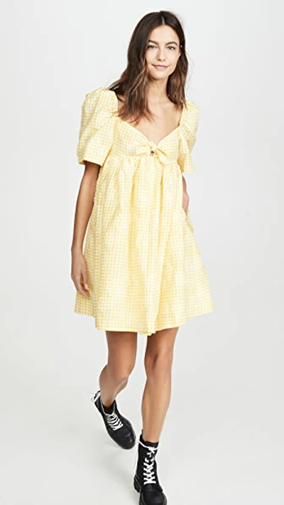 Shop Pushbutton Puff Mini Dress In Yellow