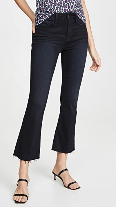 Shop Frame Le Crop Mini Boot Raw Edge Jeans In Marcella