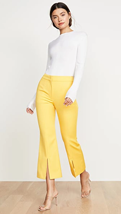 Shop Adam Lippes Tropical Bell Crop Trousers In Canary