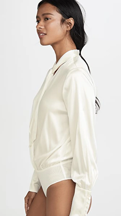 Shop Jonathan Simkhai Charmeuse Wrap Front Bodysuit In White