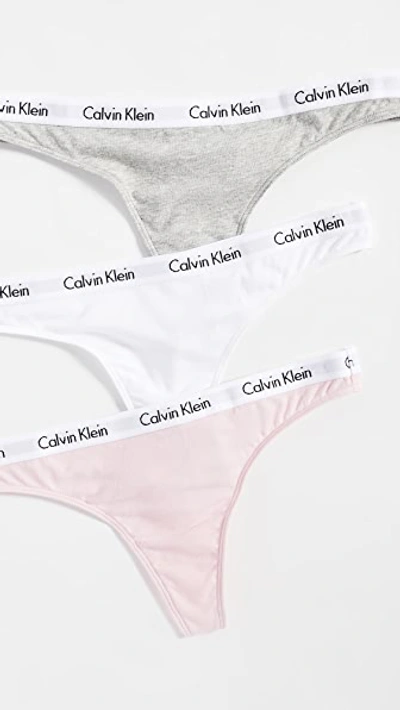 Shop Calvin Klein Underwear Carousel Thong 3 Pack In Bubblegum/white/grey Heather