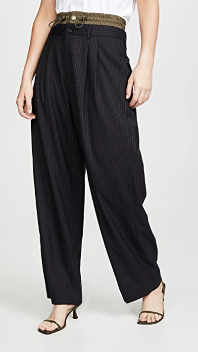 Shop Monse Pinstripe Pleated Trousers In Black Olive