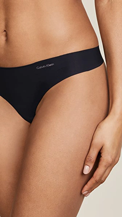 Shop Calvin Klein Underwear Invisibles Thong Black