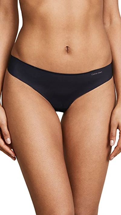 Shop Calvin Klein Underwear Invisibles Thong Black