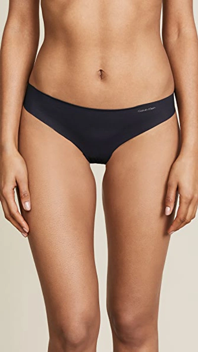 Shop Calvin Klein Underwear Invisibles Thong Black