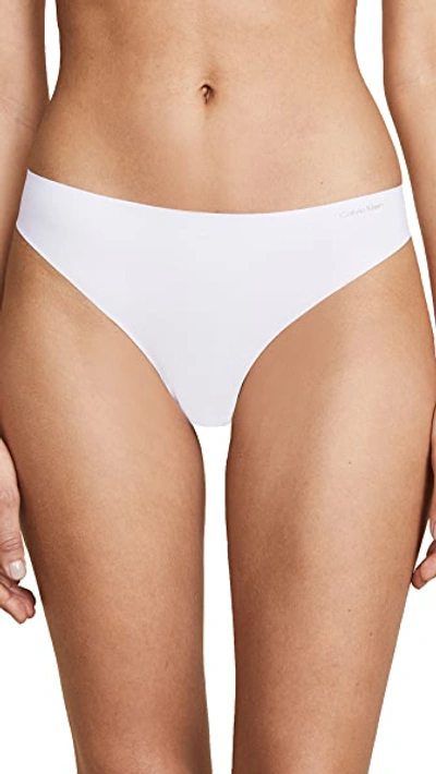 Shop Calvin Klein Underwear Invisibles Thong In White