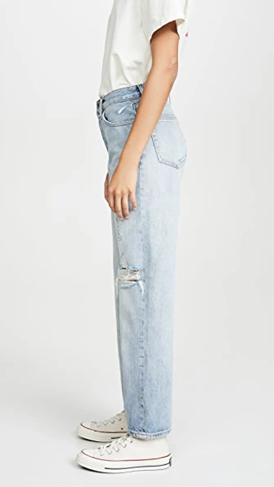 Shop Re/done 90s Loose Straight Jeans In Destroyed Light
