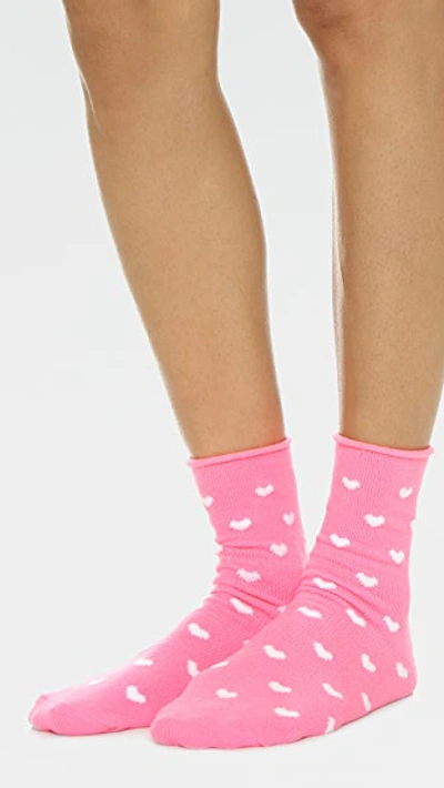 Shop Plush Heart Rolled Fleece Socks In Neon Pink