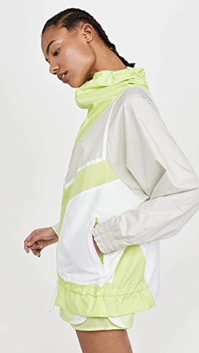 Shop Adidas By Stella Mccartney Lightweight Run Jacket In Brown/yellow