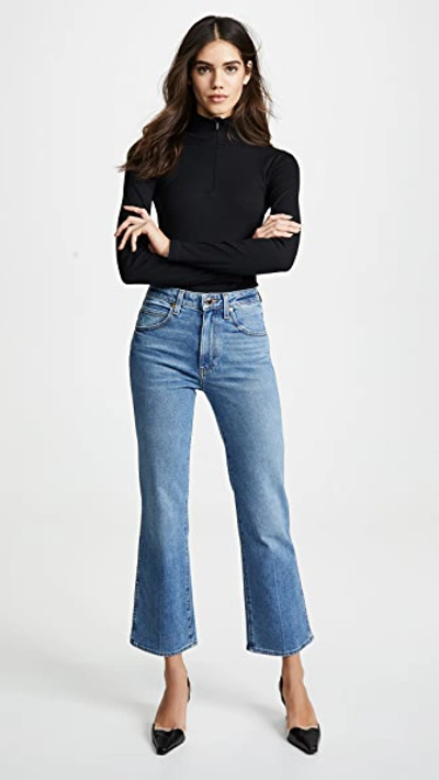 Shop Khaite Vivian New Bootcut Flare Jeans Vintage Blue