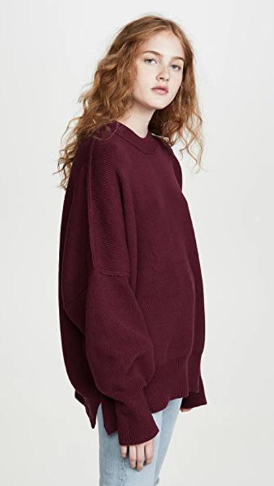 Shop Free People Easy Street Tunic Sweater In Pomegranate