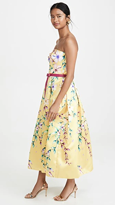 Shop Marchesa Notte Strapless Printed Corseted Gown In Yellow
