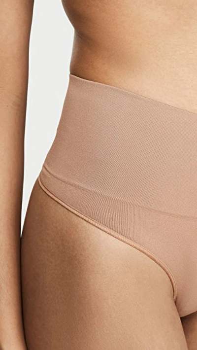 Shop Spanx Everyday Shaping Thong In Naked 3.0