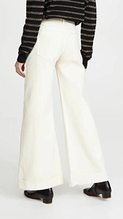 Shop Khaite Noelle Jeans In Ivory Rigid