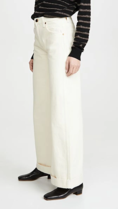 Shop Khaite Noelle Jeans In Ivory Rigid