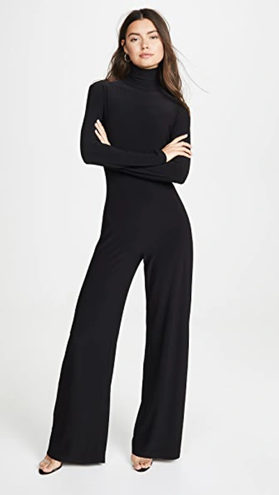 Shop Norma Kamali Long Sleeve Turtleneck Jumpsuit Black