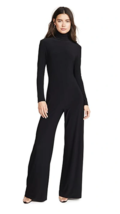 Shop Norma Kamali Long Sleeve Turtleneck Jumpsuit Black