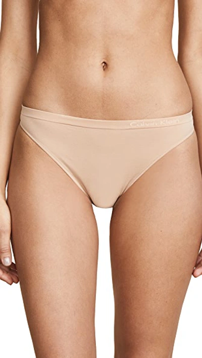 Shop Calvin Klein Underwear Pure Seamless Thong In Bare