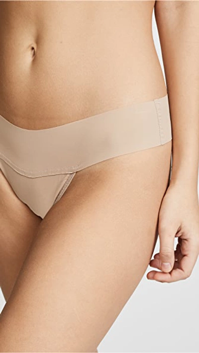Shop Hanky Panky Bare Eve Natural Rise Thong In Taupe