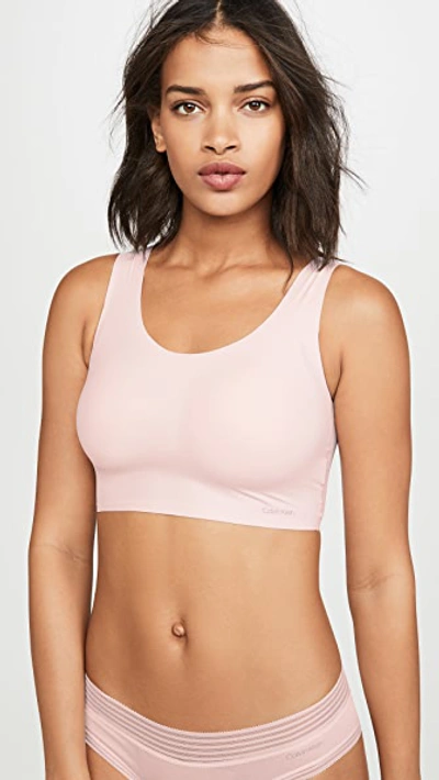 Shop Calvin Klein Underwear Invisibles Lightly Lined Bralette In Nymph's Thigh