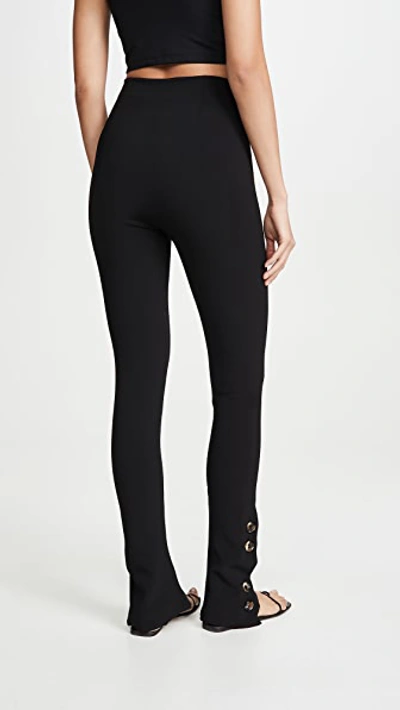 Shop A.w.a.k.e. Fitted Pants With Side And Frontal Slits In Black
