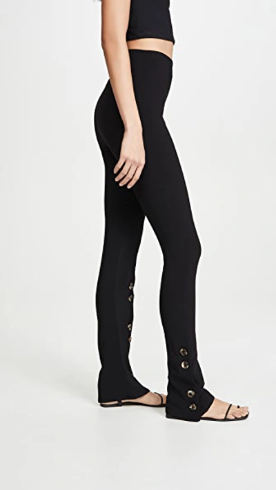 Shop A.w.a.k.e. Fitted Pants With Side And Frontal Slits In Black